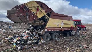 Unloading A Garbage Truck At The Dump [upl. by Maxi]